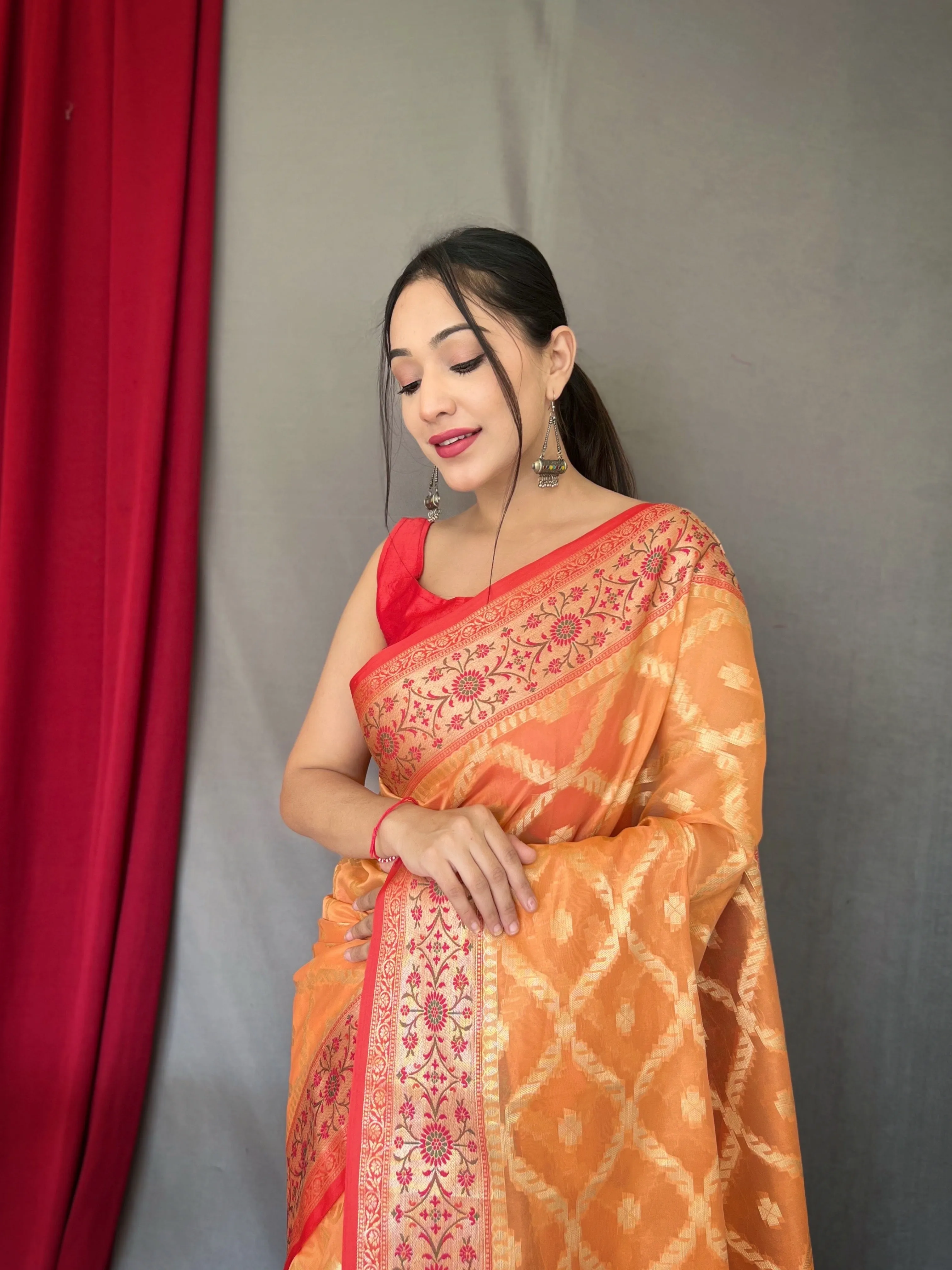 Pastel Orange Saree in Banarasi Organza Silk Woven